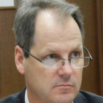 Senate President Bill Cadman (R).