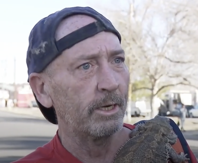 The Symbolism of Lizard Man Praising Wednesday ICE Raids