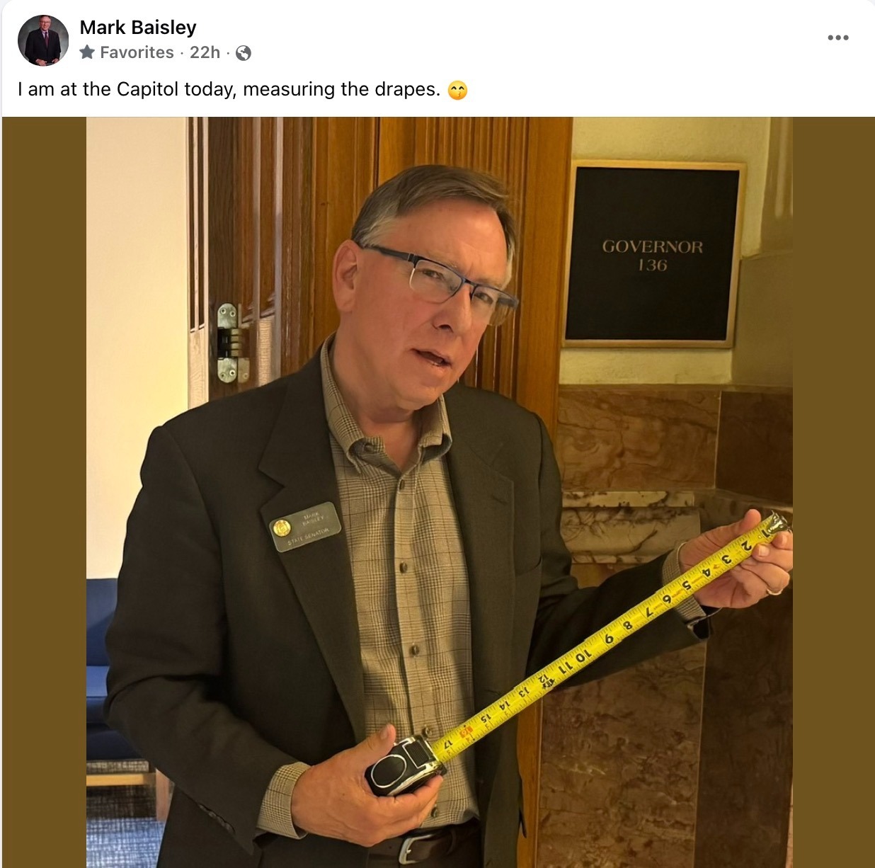 Caption This Photo: Mark Baisley Measures The Drapes, We Hope